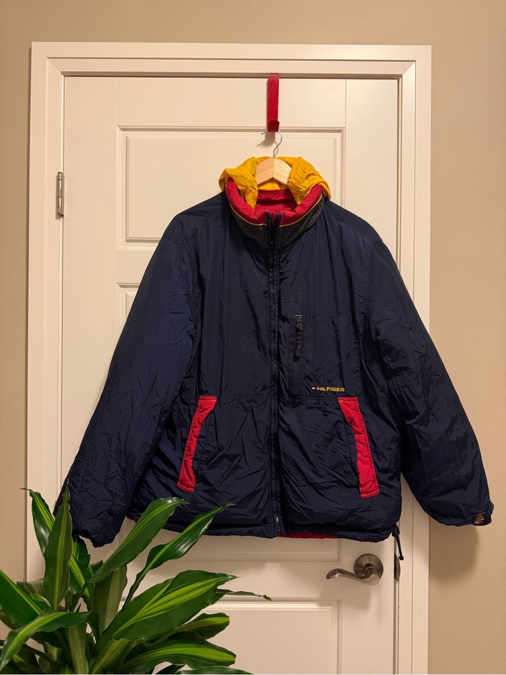 Vintage Rever Tommy Hilfiger Navy Puffer Jacket with Yellow Hood and Red Accents